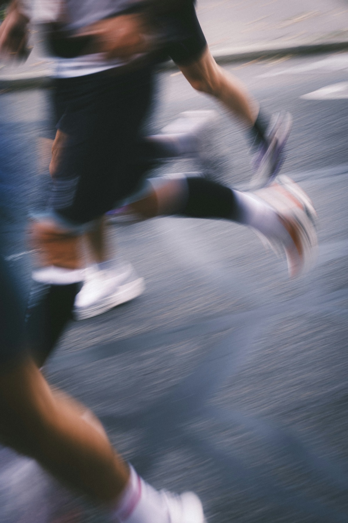 Hardlopers in beweging, motion blur